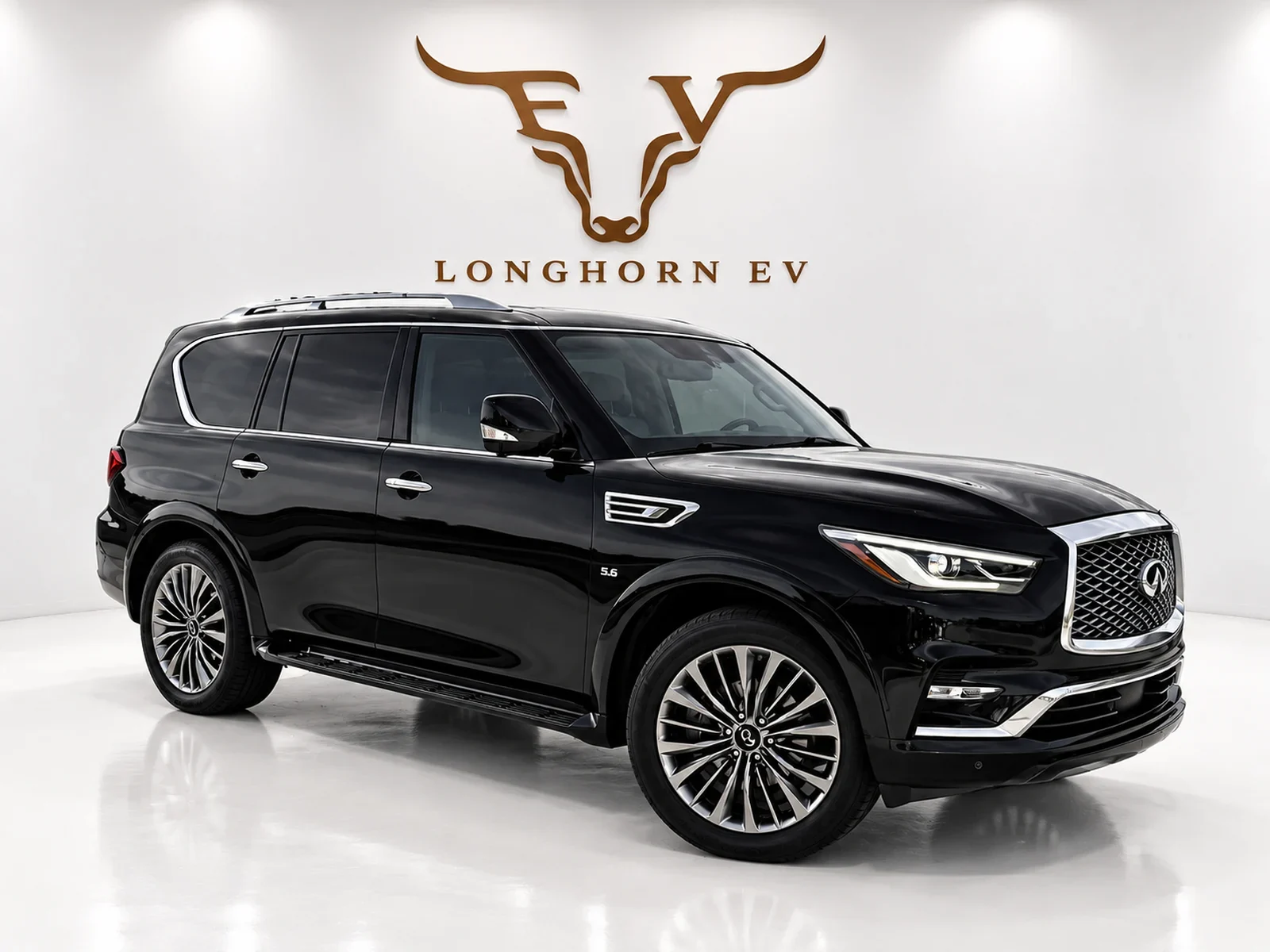 2020 Infiniti QX80 LUXE Sport Utility 4D Black exterior at Longhorn EV in Hutto, Texas