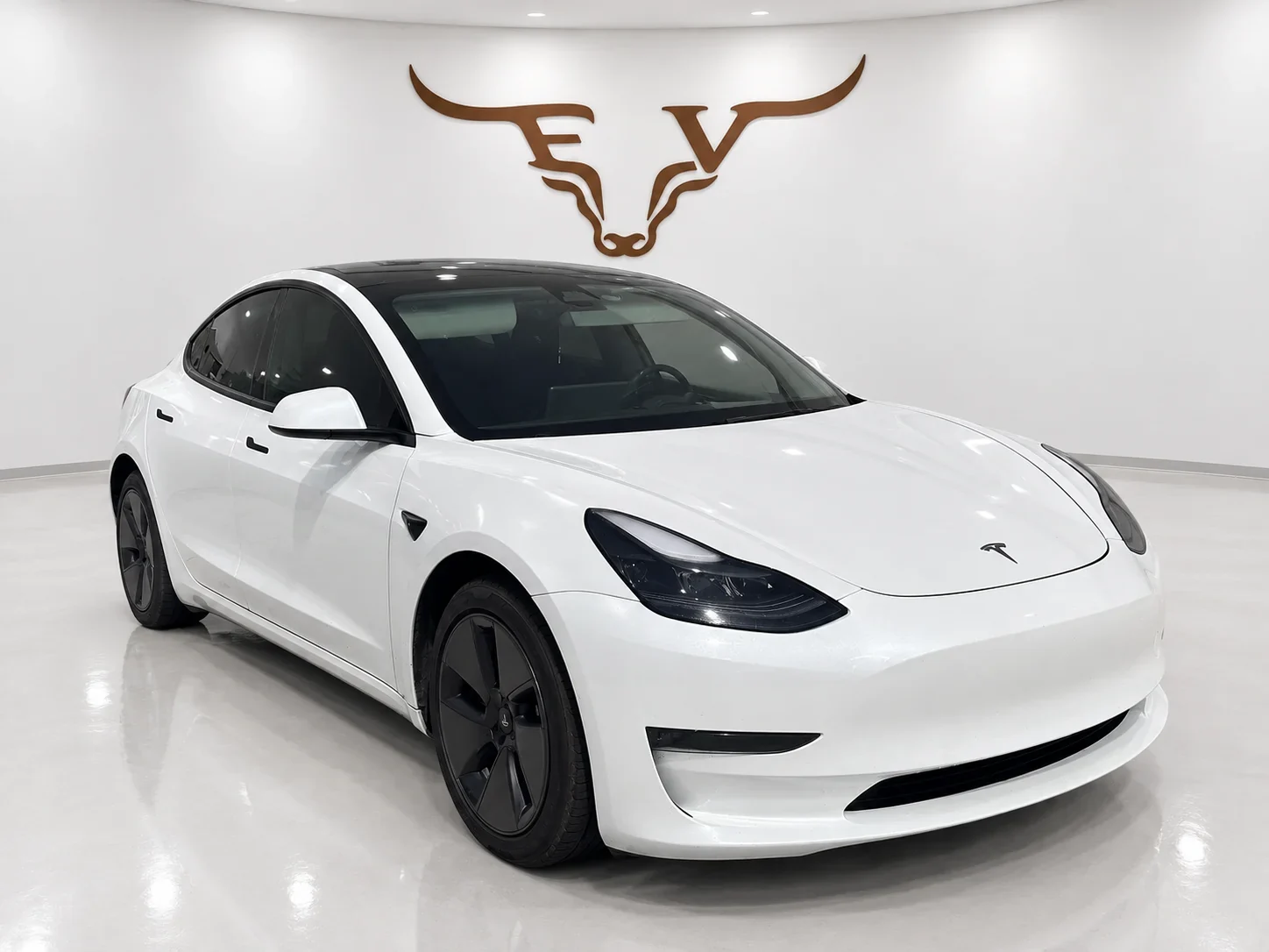 2023 Tesla Model 3 Standard Range White exterior at Longhorn EV in Hutto, Texas